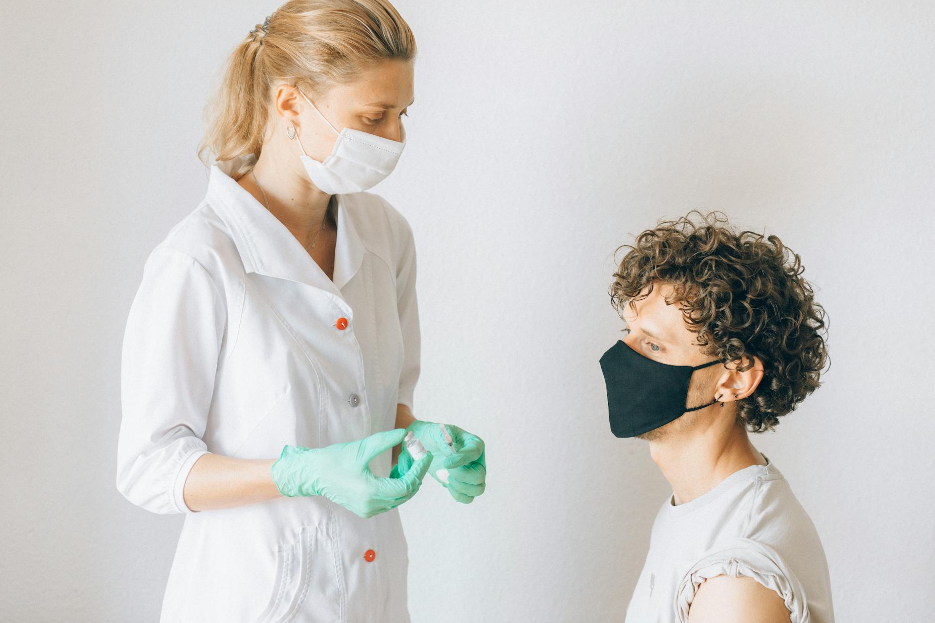 https://www.pexels.com/photo/woman-in-white-button-up-shirt-wearing-black-sunglasses-8830472/