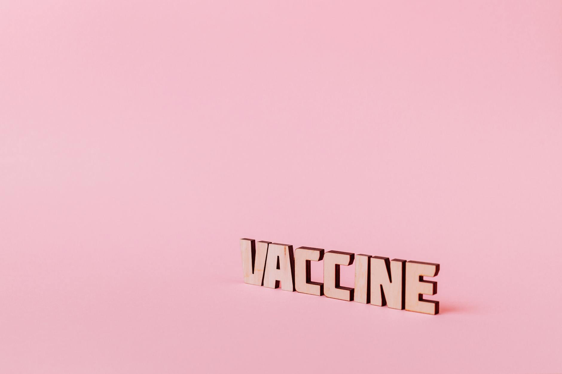 https://www.pexels.com/photo/vaccine-text-on-pink-background-5862331/